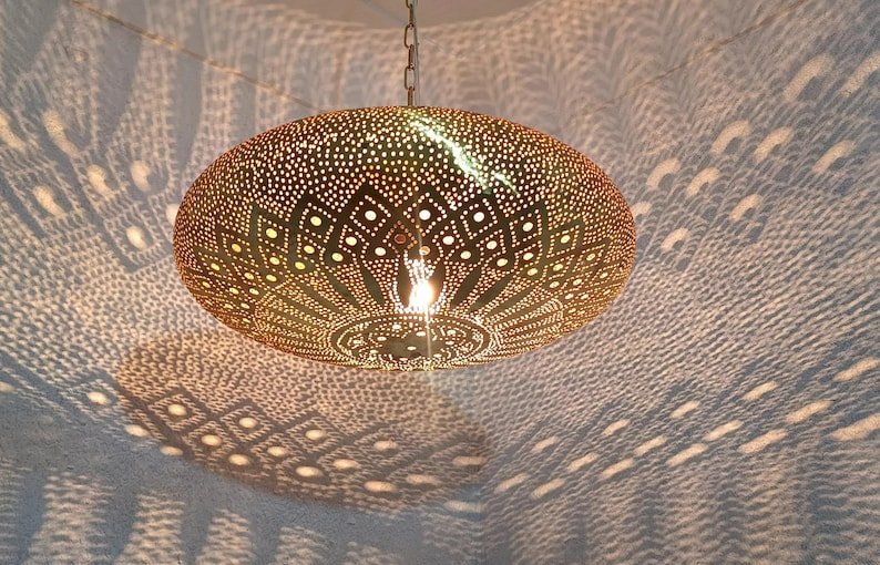 Moroccan Brass Pendant Light: Hammered Lantern with Intricate Shadow Pattern